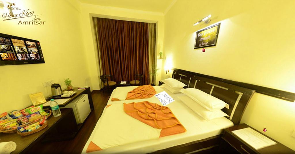 Hotel Hong Kong Inn Amritsar Rom bilde