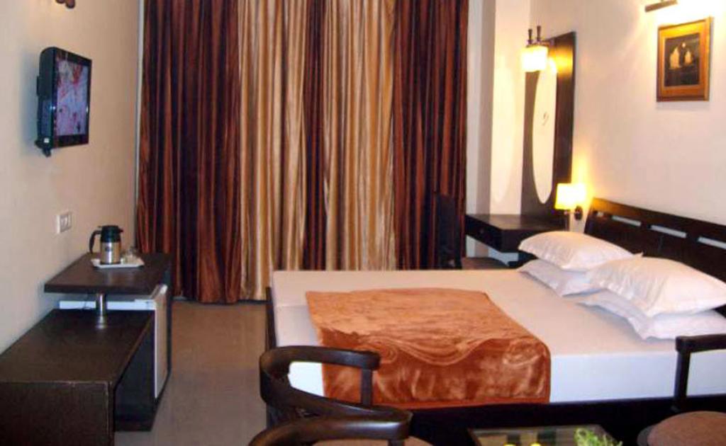 Hotel Hong Kong Inn Amritsar Rom bilde
